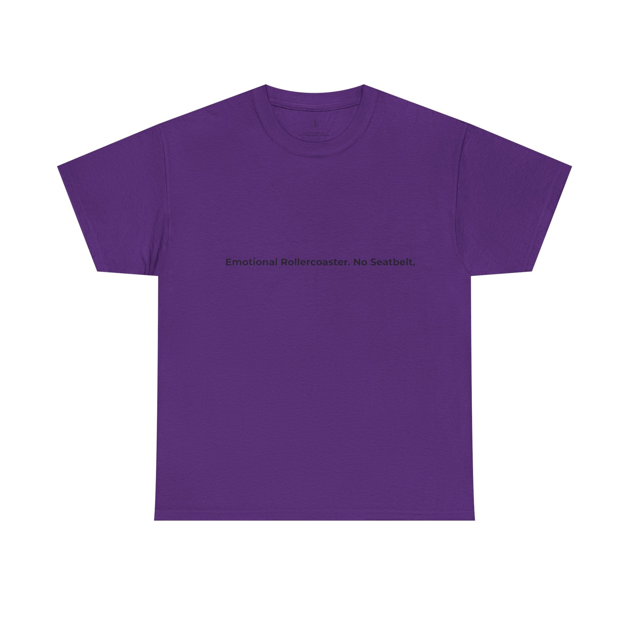 A purple short-sleeved t-shirt laid flat against a white background. Centered on the chest is the phrase “Emotional Rollercoaster. No Seatbelt.” printed in bold black text. The minimalist crew neck design pairs with the expressive message, capturing the raw, unfiltered energy of emotional intensity and the beauty of living without restraint