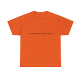 An orange short-sleeved t-shirt laid flat against a white background. Centered on the chest is the phrase “Emotional Rollercoaster. No Seatbelt.” printed in bold black text. The minimalist crew neck design pairs with the expressive message, capturing the raw, unfiltered energy of emotional intensity and the beauty of living without restraint