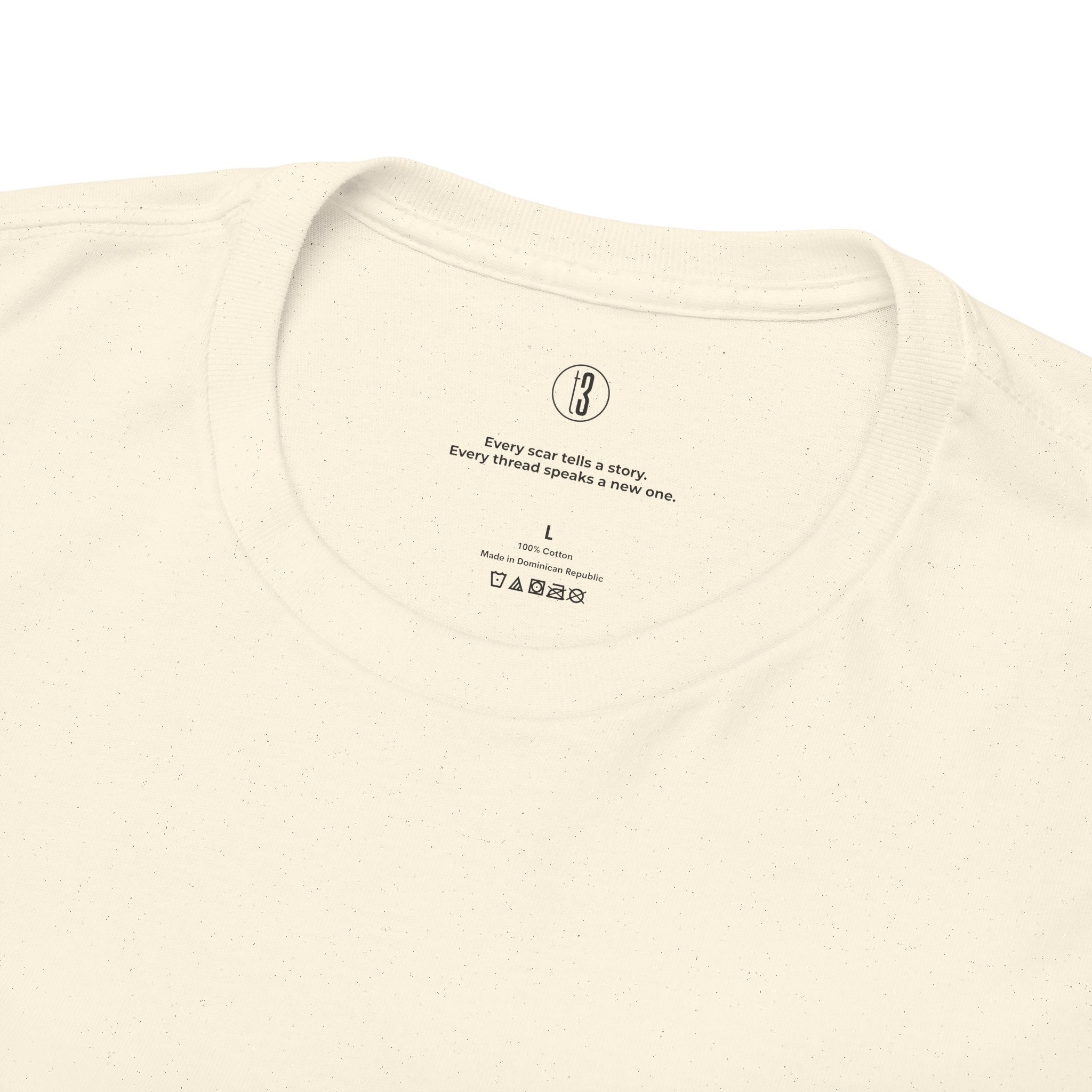 Beige t-shirt with text and branding on a white background